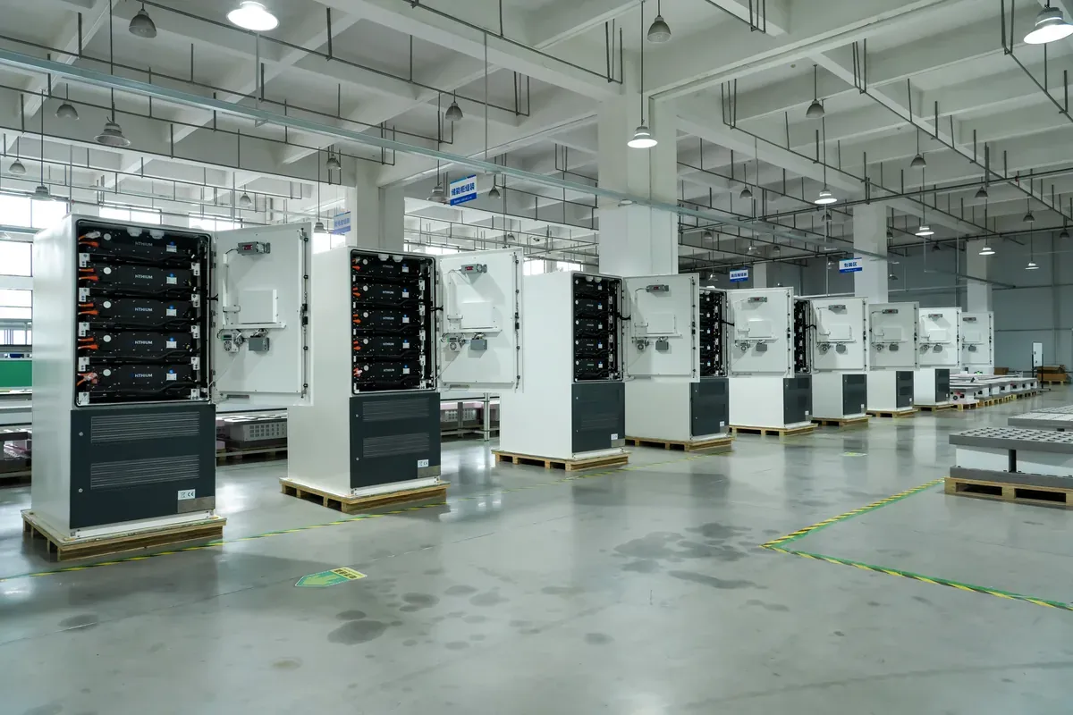 Hithium DC cabinets shown closed and open during production inspection