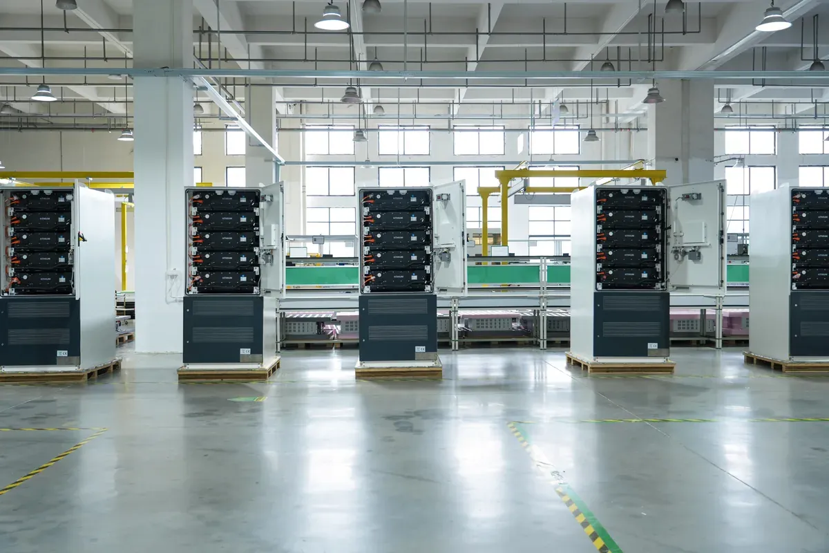 Several open Hithium DC battery cabinets during technical inspection
