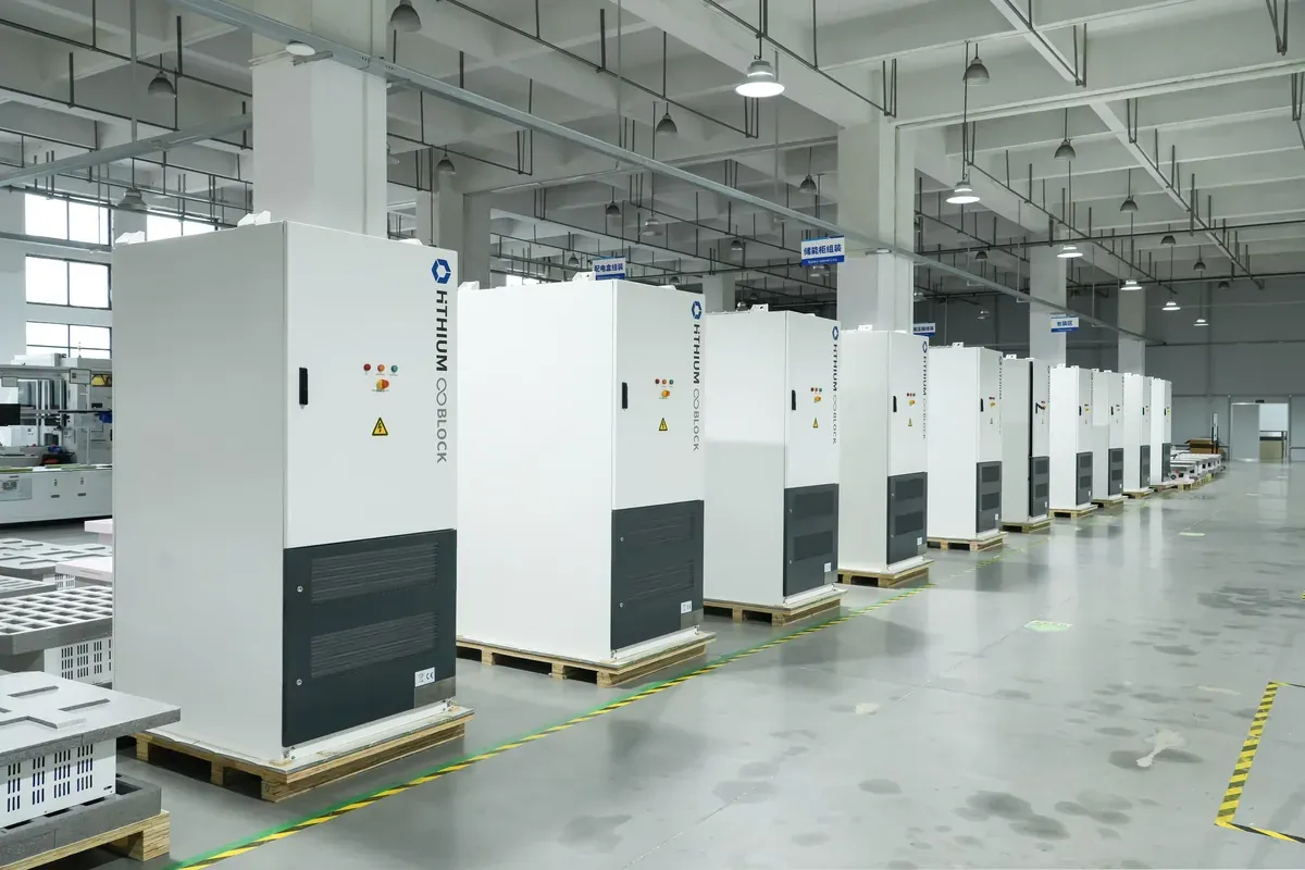 Rows of closed Hithium DC battery cabinets on the production line